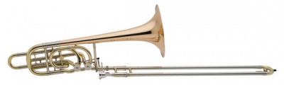 Тромбон –бас "Bb/F/D/Gb,Eb/G-Tuning" HOLTON TR-181 (Пр-во США) серия “Artist” , с 2-мя роторами в ЛИНИЮ, ТАМПАКОВЫЙ  цельный раструб  ручной ковки  диаметром  10” (254мм), мензура 562” (14,27мм), кулиса с мельхиоровым покрытием , материал - желтая медь, п